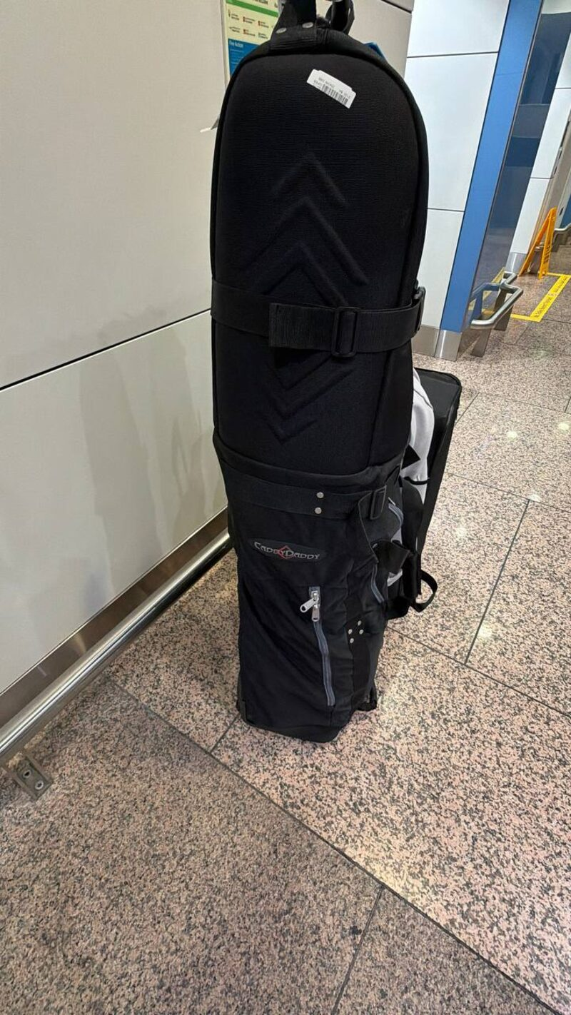 Caddy Daddy travel bag at the airport. about to cross three airlines and two continents