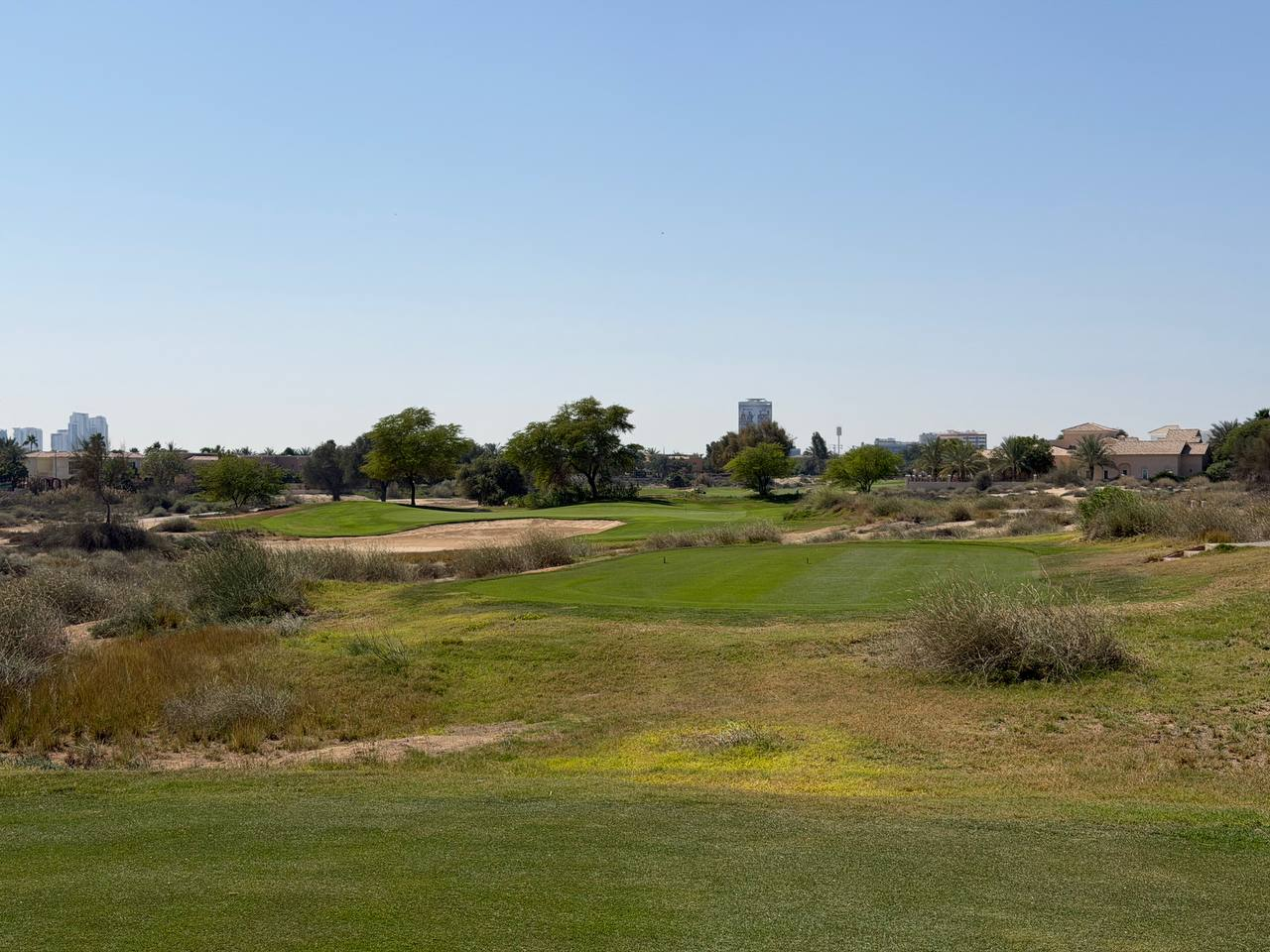 Arabian Ranches Golf course with sand and trees