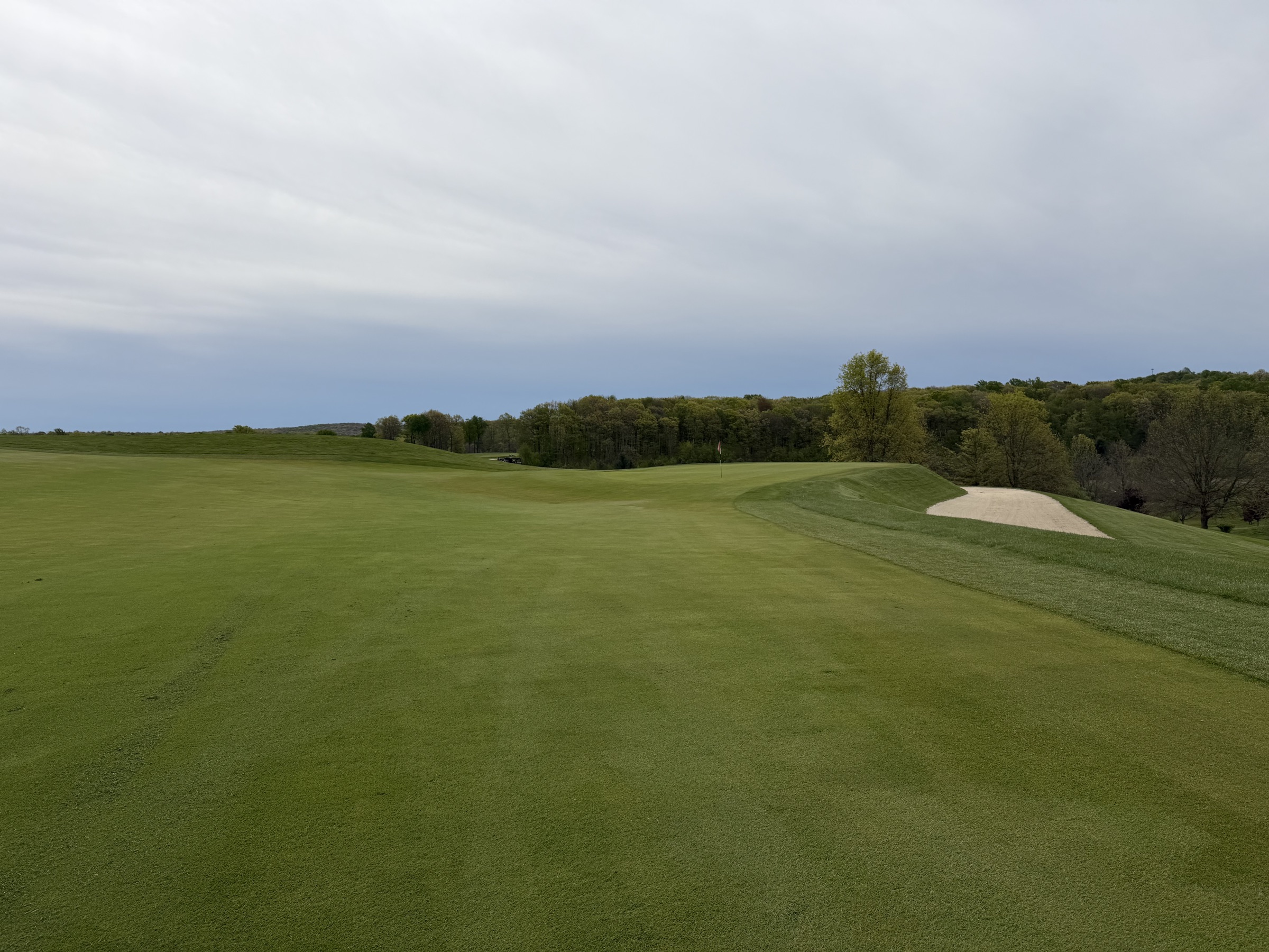Long uphill fairway with the Pete Dye sand on the right — the routing keeps you working